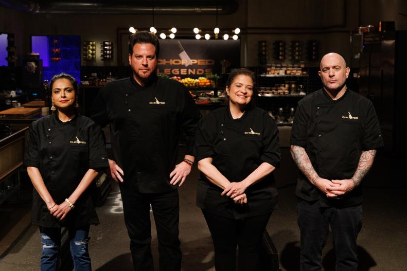 Chefs Maneet Chauhan, Scott Conant, Alex Guarnaschelli and Chris Santos pose together, as seen on Chopped: Legends, Season 59.
