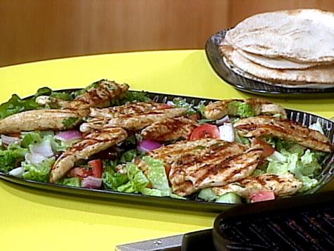 Greek Grilled Chicken and Vegetable Salad with Warm Pita Bread for Wrapping