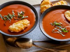 When time is of the essence, make Rachael Ray's Quick Creamy Tomato Soup recipe from 30 Minutes Meals on Food Network.