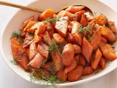 Get the most out of your root vegetables with Ina Garten's Roasted Carrots recipe from Barefoot Contessa on Food Network.