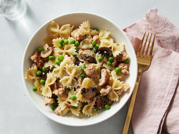 Giada De Laurentiis' Farfalle with Turkey Sausage, Peas and Mushrooms, as seen on Food Network's Everyday Italian, Season 1