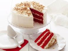 Bake a classic Southern Red Velvet Cake recipe from Food Network that's slathered in cream cheese frosting and sprinkled with crushed pecans.