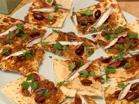 Flatbread with White Bean Hummus, Caramelized Onions, Black Olives and Spanish White Anchovies