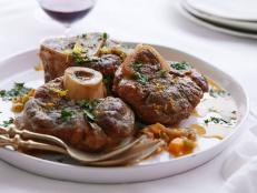 Get Giada De Laurentiis' classic Osso Buco recipe, braised low and slow until the veal is fall-off-the-bone tender, from Everyday Italian on Food Network.