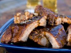 On Good Eats, Alton Brown's Who Loves Ya Baby-Back recipe for ribs starts with a flavorful dry rub of brown sugar, chili powder and other spices.