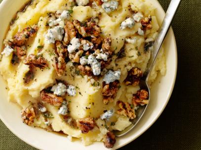 A Cream Dish of Whipped Potatoes Sprinkled with Walnuts, Blue Cheese and Herbs
