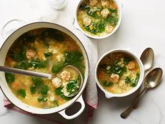 Ina Garten uses chicken meatballs and vegetables in her version of classic Italian Wedding Soup, from Barefoot Contessa on Food Network.