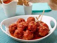 Anne Burrell uses a blend of beef, veal and pork to achieve the perfect balance of flavor in her 5-star Excellent Meatballs recipe.