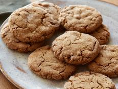 Bake Ina Garten's Ultimate Ginger Cookie recipe from Barefoot Contessa on Food Network for a spiced treat intensified with molasses and crystallized ginger.