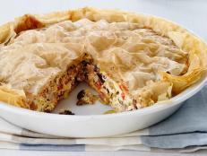 Challenge Winners pie in a white dish  on a blue and white plaid cloth