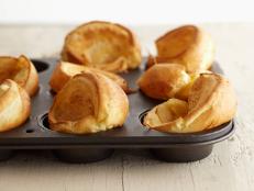 Bake Melissa d'Arabian's recipe for hollow, golden Foolproof Popovers from Ten Dollar Dinners in a muffin tin for the perfect accompaniment to a Sunday roast.