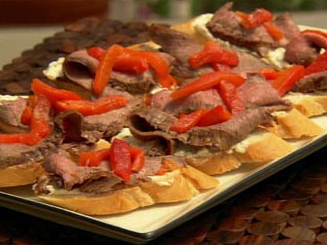 Molasses Marinated Flank Steak with Roasted Red Peppers