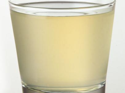 A Kamikaze cocktail in a lowball glass against a white background