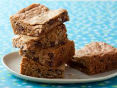 Soft, chewy and packed with chopped hazelnuts, shredded coconut and dark chocolate chips, Guy’s blondies offer a unique take on traditional holiday cookies.