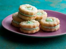 Melissa nestles a cool mint-butter filling between two tangy cream-cheese based sugar cookies and dusts them with fine colored sugar.