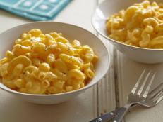 Ree Drummond's creamy Macaroni and Cheese recipe can be served right away for stovetop mac and cheese, or made ahead and topped with extra Cheddar cheese for that classic baked macaroni and cheese taste.