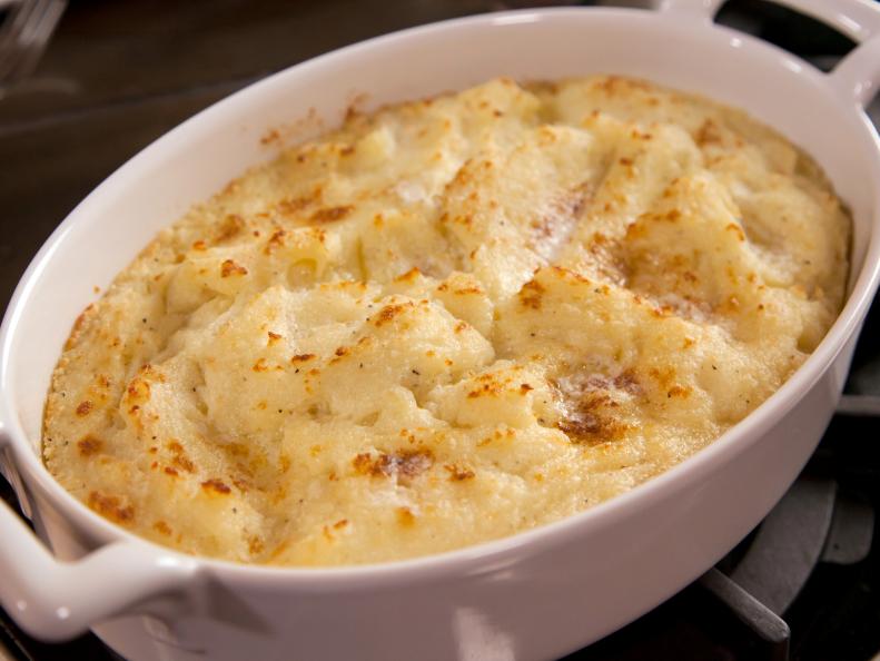 Ree Drummond - Host prepares mashed potatoes, chicken fried steak and marinated tomato salad during episode 1 as seen on Food Network's Pioneer Woman Season 1. 