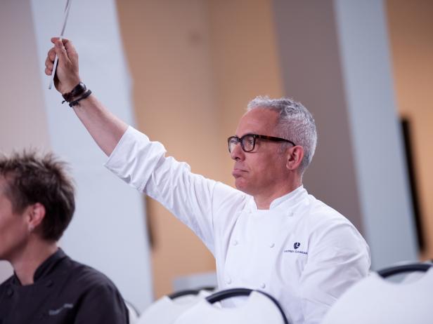 Rival-Chef Geoffrey Zakarian bidding on ingredients for Episode 6 Chairman's Challenge "Risk" as seen on Food Network Next Iron Chef Season 4.