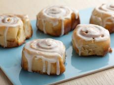 For a sweet treat, bake Alton Brown's Overnight Cinnamon Rolls; let the dough rest overnight so they become plump, fluffy and perfect with cream cheese icing.