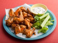 Get the spicy bar staple at home by roasting Alton Brown's Buffalo Wings recipe from Good Eats on Food Network.