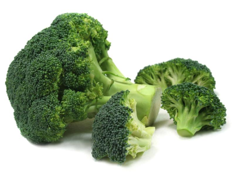 a bunch of broccoli on a white background
