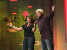 (L-R) Hosts Rachael Ray and Guy Fieri choose their teams for the season from the celebrity contestants after tasting the sandwiches they created for the first challenge as seen on Episode 1 of Food Network's Rachael Vs. Guy Season 1