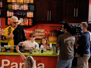 Guy Fieri Cooks With Kids In Miami At Cooking Expo