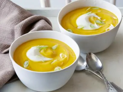 CHILLED CARROT AND CAULIFLOWER SOUP, Melissa Dâ  Arabian, Ten Dollar
Dinners/Dreaminâ   of Tagine, Food Network, Olive Oil, Onion, Carrots, Cauliflower, Red Pepper
Flakes, Lemon Zest, Cumin, Chicken or Vegetable Stock, Plain Yogurt, Green Onion