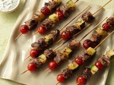 Grilled Lamb Kebabs with Tomatoes, Zucchini, and Yogurt Sauce