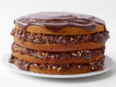 Having a hard time deciding what pie to make for Thanksgiving dessert? Take a departure from the traditional, and try Food Network Magazine’s Pumpkin Spice Cake with Chocolate-Pecan Filling.