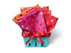 Step up your usual wrapping job this year by presenting gifts in these farmer's berry baskets.