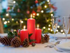 Thinkstock image of candles and pinecones for a holiday centerpiece.