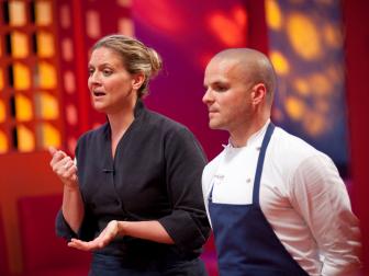 Rival Chefs Amanda Freitag and Nate Appleman presenting their buffet dishes to the for the Chairman's Challenge "Transcendence" as seen on Food Network’s Season 5.