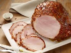 Make your next holiday centerpiece this top-rated Baked Ham with Brown Sugar Mustard Glaze recipe from Food Network.