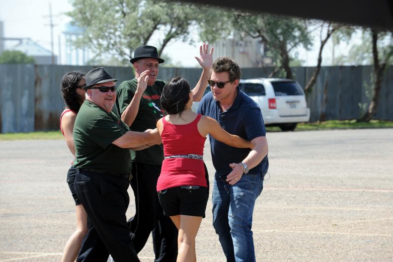 Host Tyler Florence (right) welcomes Nonna's Kitchette and Pizza Mike's teams to Amarillo as seen in Food Network's The Great Food Truck Race, Season 3.