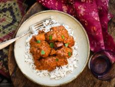 Aarti Sequeira's simple chicken curry recipe is easy to prepare and packed with classic Indian curry flavors thanks to a mix of garam masala, cumin seeds, bay leaves, fresh ginger, chiles, turmeric and paprika.