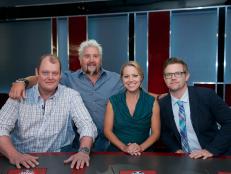 Host Guy Fieri poses with judges Beau MacMillan, Melissa D'Arabian, and Richard Blais during taping of the Food Network's Guy's Grocery Games, Season 1.