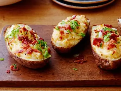 TWICEBAKED
POTATOES
Trisha Yearwood
Trishaâ  s Southern Kitchen/Karrioke
Food Network
Baking Potatoes, Olive Oil, Milk, Butter, Sour Cream, Sharp Cheddar Cheese, Garlic Salt, Salt,
Pepper, Bacon, Green Onion,TWICEBAKED
POTATOES
Trisha Yearwood
Trisha’s Southern Kitchen/Karrioke
Food Network
Baking Potatoes, Olive Oil, Milk, Butter, Sour Cream, Sharp Cheddar Cheese, Garlic Salt, Salt,
Pepper, Bacon, Green Onion