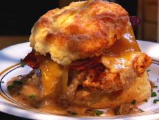 At this comfort food restaurant, everything is served up on biscuits. Guy could not get enough of the classic biscuits and gravy, noting that the biscuit had the "best texture ever." He also devoured The Reggie with fried chicken, bacon, cheddar and gravy all inside a "flaky and light" biscuit.