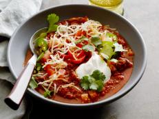 GAME DAY CHILI
Geoffrey Zakarian
The Kitchen/The Big Game
Food Network
Olive Oil, Ground Meat, Garlic, Onions, Scallions, Tomato Paste, Chile Powder, Dark Beer,
FireRoasted
Tomatoes, Chicken Stock, Red Hot Sauce, Greet Hot Sauce