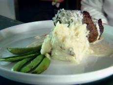 At this upscale diner, Chef Michael Patrick is reinventing Southern comfort food. The savory chorizo meatloaf juxtaposed with tangy green tomato gravy tantalized Guy's taste buds, while the lobster pronto pups had a light batter and perfectly tender meat.