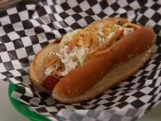 <p>At this hot dog dive, Chef Perry Cuda is topping wieners with some unusual choices like bananas and peanut butter. Guy enjoyed the Frank Cuda, a dog topped with chili, blue cheese slaw, applewood bacon, cheese and crispy onions. Locals recommend the sweet tea-marinated, fried pork chop sandwich.</p>
