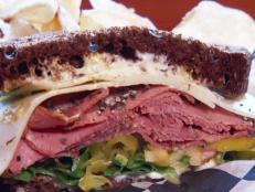 <p>Smoked-fish fanatics will get a mouthful at Northern Waters Smokehaus, where they're smoking everything from salmon to lamb and even curing their own salumi. But Guy had to stop by for their bison pastrami, Pastrami Mommy sandwich and whitefish basket &mdash; a quintessential Lake Superior dish.</p>