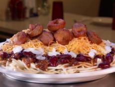 <p>The chili at this Cincinnati institution can be served plain, 3-way, 4-way, 5-way or 6-way. Learning the lingo didn't take long for Guy Fieri. He ordered the 6-way, which includes everything: chili, spaghetti, beans, onions, cheese and fried jalapeno caps.</p>