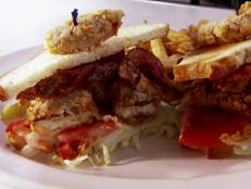 <p>At Bubba's Diner, they believe that "great ingredients turn out really good quality food." The Ahi Tuna Pot Stickers with homemade wrappers served on a bed of wilted spinach melted in Guy's mouth, as did the Soft-Shell Crab BLT. Locals like the Kobe beef meatloaf and Creme Brulee French Toast.</p>