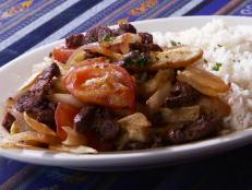 <p>Peruvians and Chicagoans both head to Taste of Peru in Chicago for authentic chicken tamales, Anticuchos (beef heart kebabs) and Guy's favorite: Lomo Saltado. Along with succulent fried beef, onions and tomatoes, this dish adds french fries, making it what Guy calls "right on-point goodness."</p>