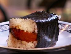 <p>Bobby's Hawaiian Style may be miles away from Hawaii, but owner Bobby Nakihei stayed true to his culinary roots. Guy loved his style. Bobby's making all the classics, like Kalua pork, Lau Lau (a pork dish wrapped in taro leaves and steamed) and the beloved Spam musubi, spam prepared sushi-style.</p>