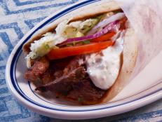 <p>At this authentic eatery, you're getting real Greek food made by two brothers who once left Greece to go to college and ended up serving their mother's recipes at Greek Corner instead. Enjoy a meat attack, just as Guy did with the "tetris of meat and lamb" in their layered meat gyro.</p>