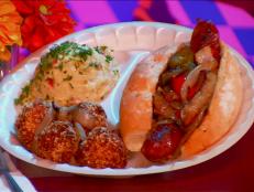 Have a craving for handmade bratwurst? Follow Guy’s lead and head over to Brats Brothers, which draws diners from across the globe eager to sample some delectable sausages. Savor a classic brat made from pork or veal, or indulge in an exotic option like a wild boar andouille or a kangaroo sausage.