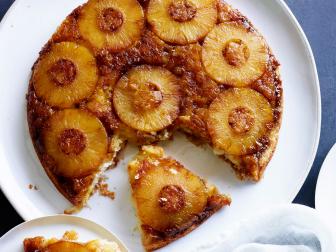 PINEAPPLE UPSIDEDOWNCAKE, Damaris Phillips, Southern at Heart/Card Gamewith Grampy, Food Network, Unsalted Butter, Dark Brown Sugar, Sliced Pineapples,Crushed Pineapple, AllpurposeFlour, Baking Powder, Milk, Vanilla Extract, PineappleJuice, Sugar, Coconut Oil, Egg